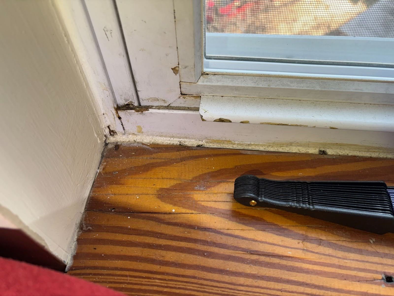 Image of Philly window sill before Dr. Leaks performed the window leak repair