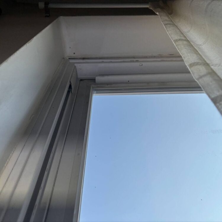 Image of Philly window sill before Dr. Leaks performed the window leak repair